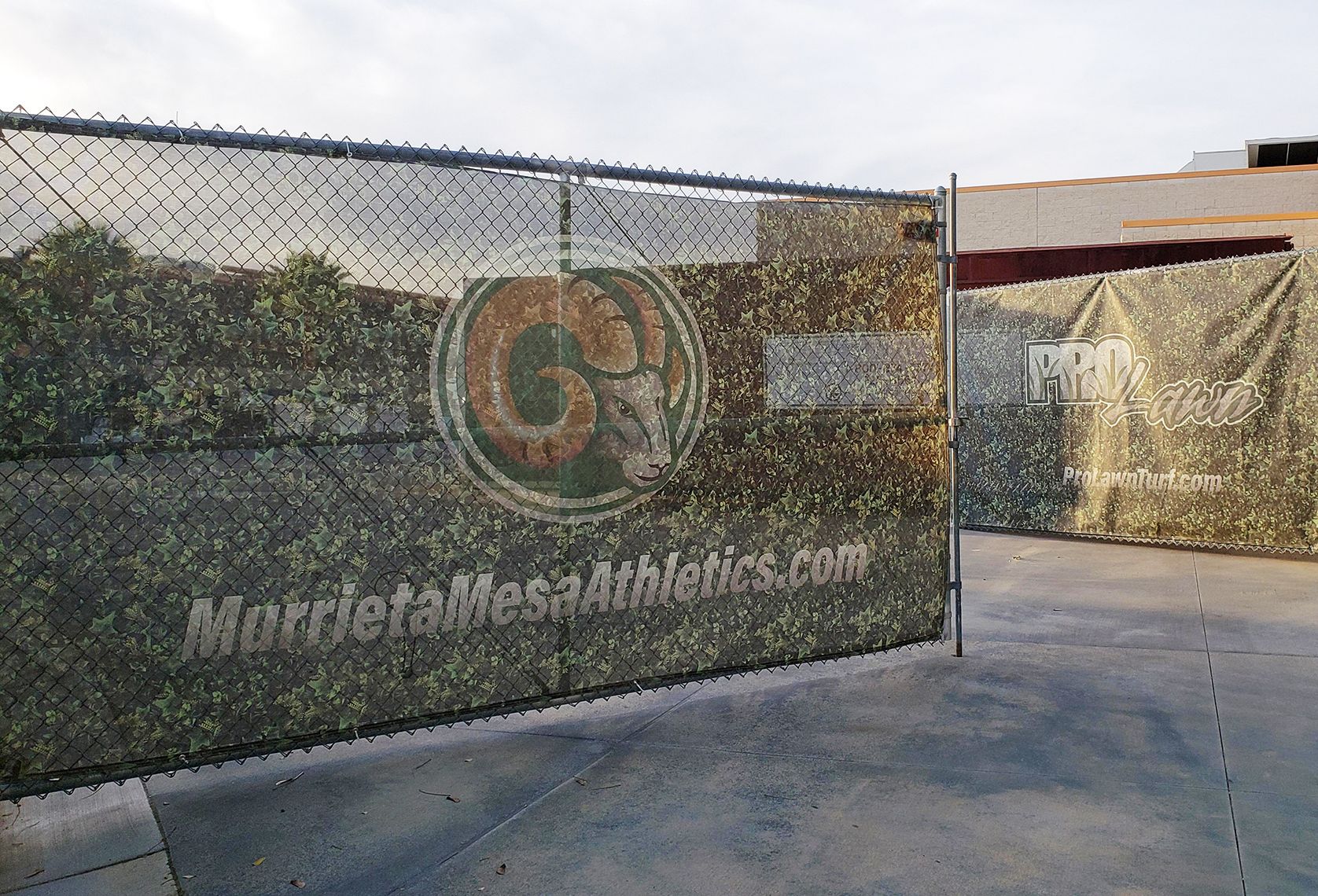 Outdoor mesh banner for athletics company